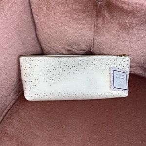 Lauren Conrad Cream and gold polka dot zippered pouch